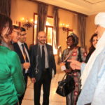 Delegates confer during a break: credit -CNDP